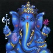What is Ganesha holding in his hands?